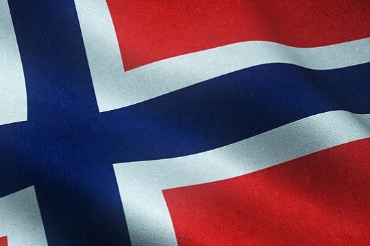 Closeup shot of the waving flag of Norway with interesting textures